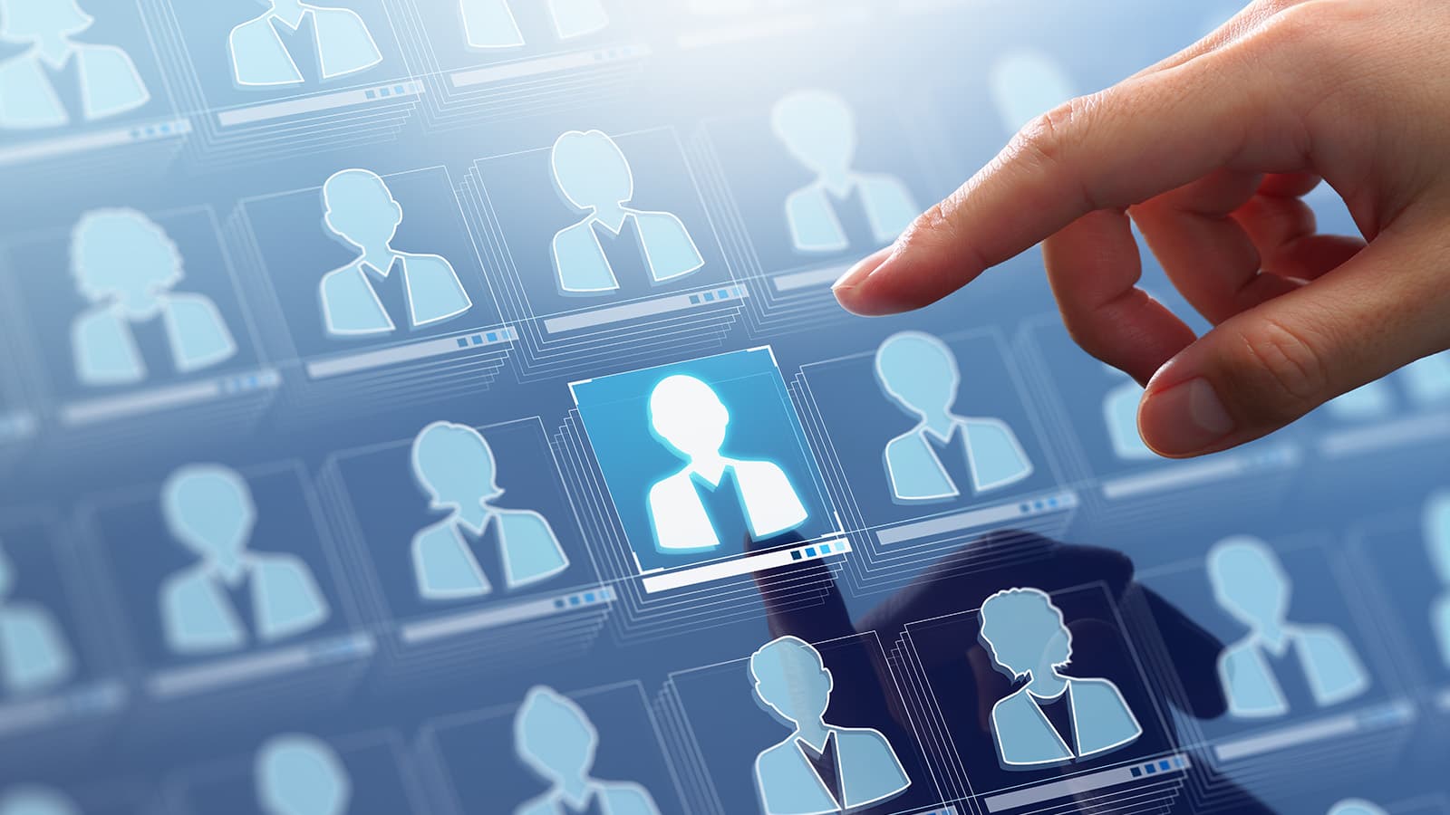 Businessman touching customer icon in a customer data and marketing database system.