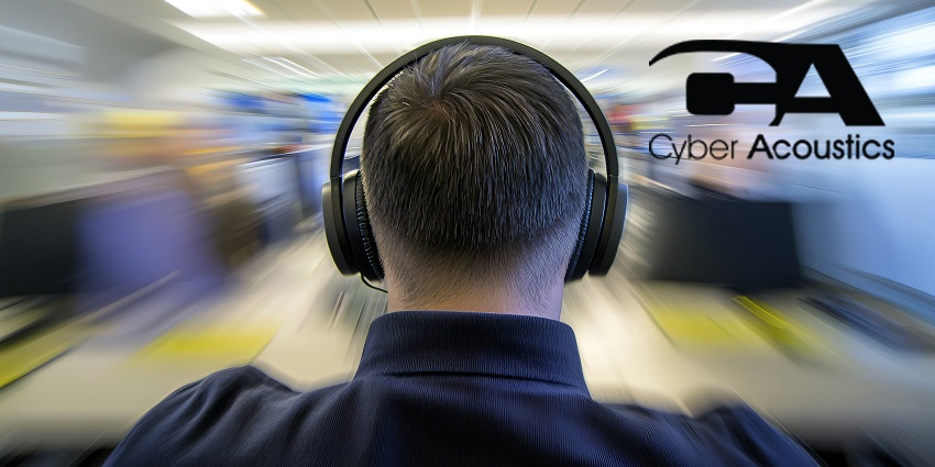 Man wearing noise cancelling headphones in office