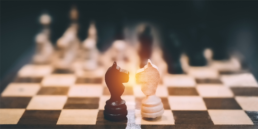 Chess board game concept illustrate Business strategy idea planing to checkmate the enemy and defeat opponent for achieve the target by intelligence idea