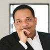 A headshot of Ram Menon
