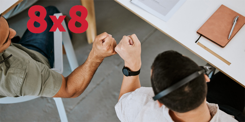 Excited call centre agents, fist bump and celebrating deal, promotion and sale from above in office. Motivated, happy and successful telemarketing colleagues or customer support operators cheering