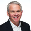 A headshot of Mike Szilagyi