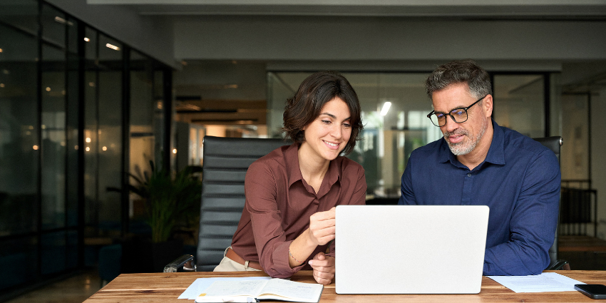 Contact center agents using Workforce Engagement Management (WEM) tools to monitor performance and manage customer interactions